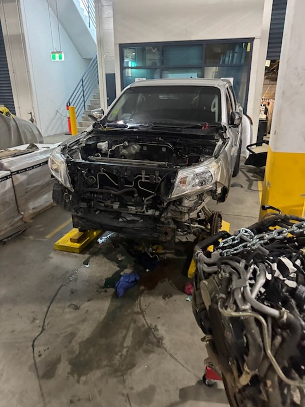 Engine removed from a vehicle for mechanical repairs